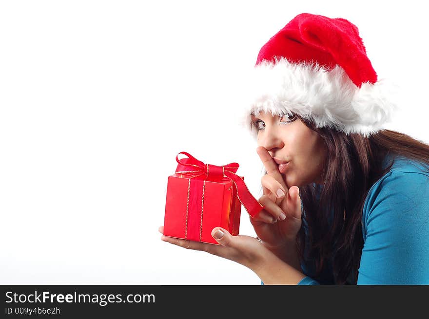 Attractive woman with santa claus hat and gift on white background. Attractive woman with santa claus hat and gift on white background