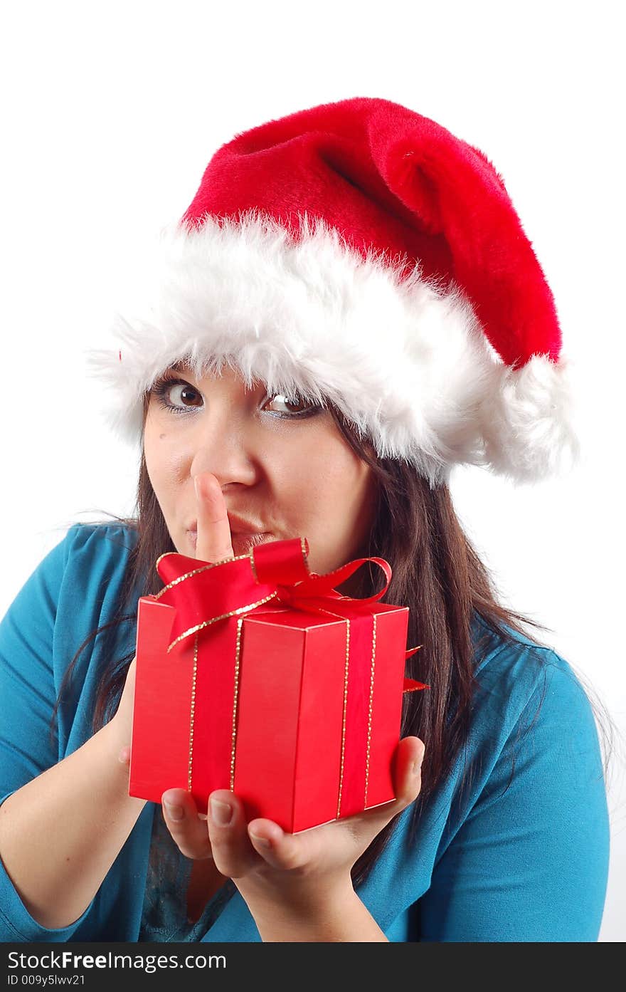 Attractive woman with santa claus hat and gift on white background. Attractive woman with santa claus hat and gift on white background