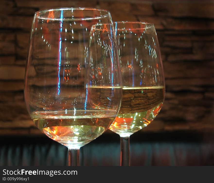 Two glass whith white wine. Two glass whith white wine