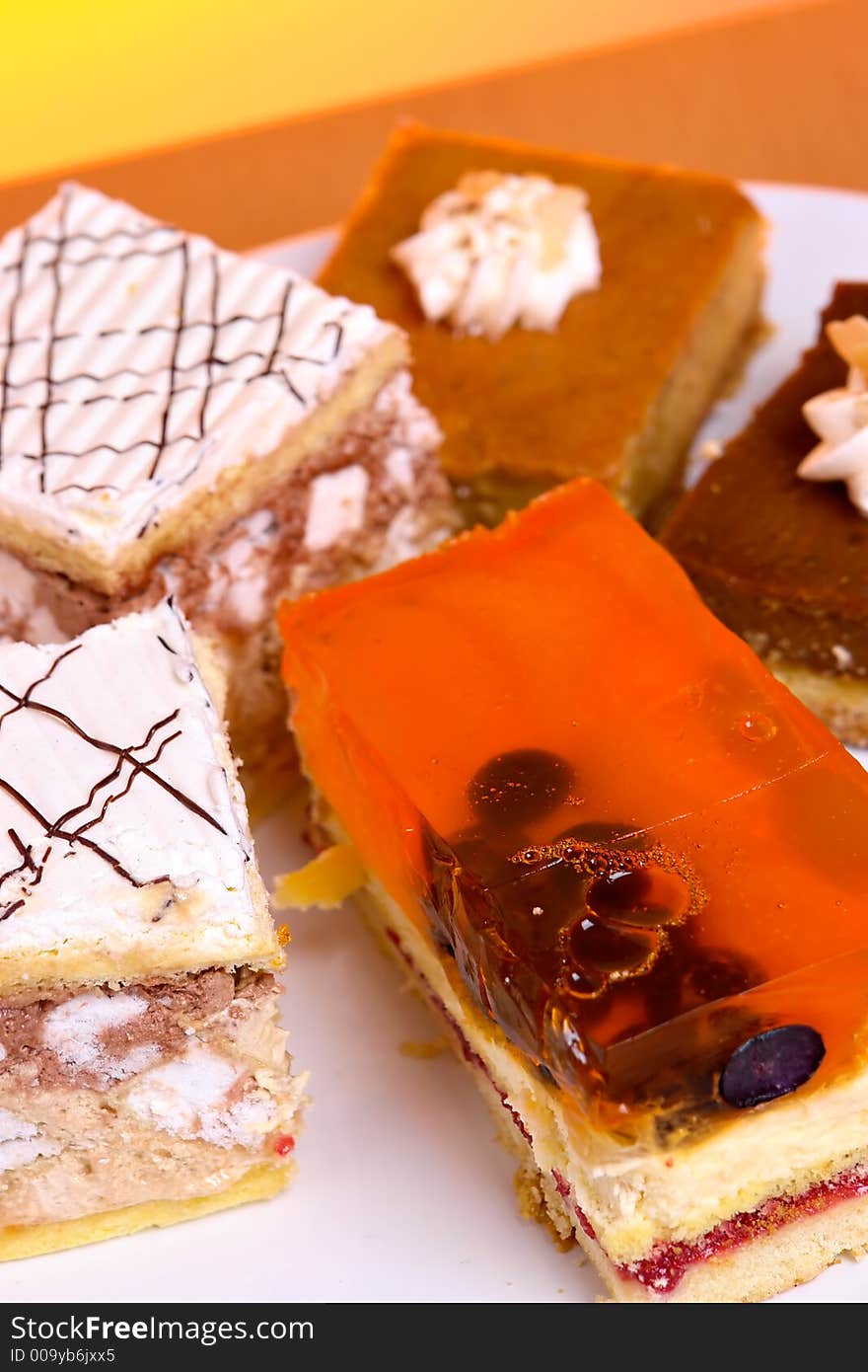 Plate full of delicious cakes. Plate full of delicious cakes