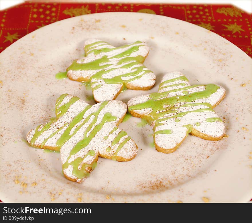 Homemade giant christmas cookies in star form on a plate. Homemade giant christmas cookies in star form on a plate