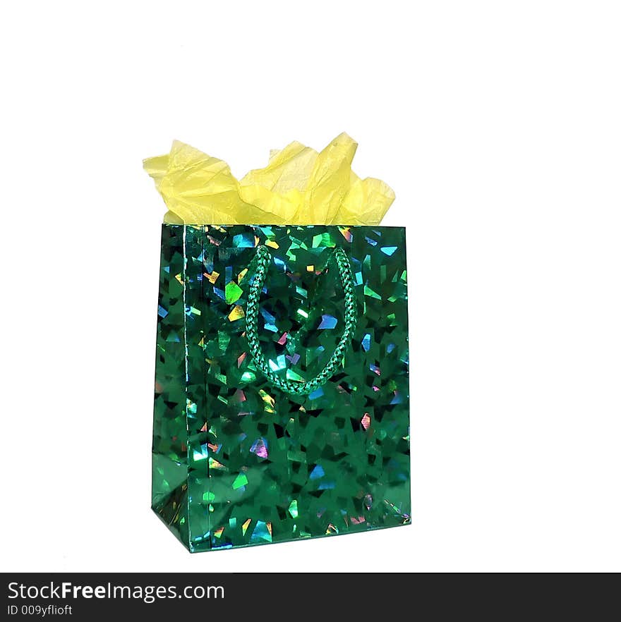 Photo of a gift bag commonly used for small gifts isolated on a white background. Photo of a gift bag commonly used for small gifts isolated on a white background