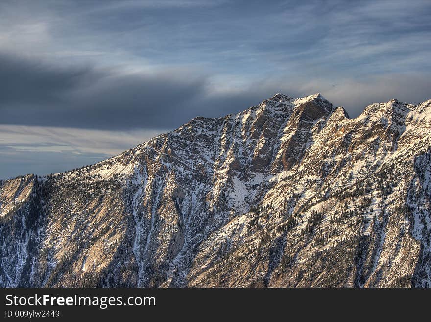 Mountain ridge and clouds upclose