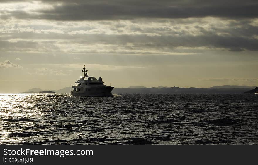 Motor yacht Teddy in late afternoon in an upcoming gale at Cap Ferrat