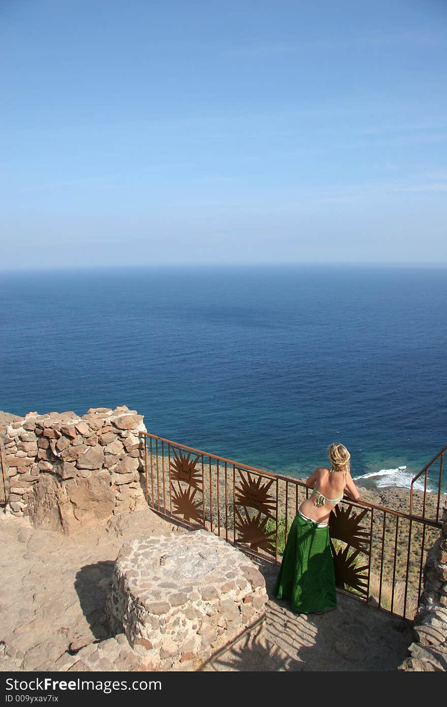 A woman watching the horizon