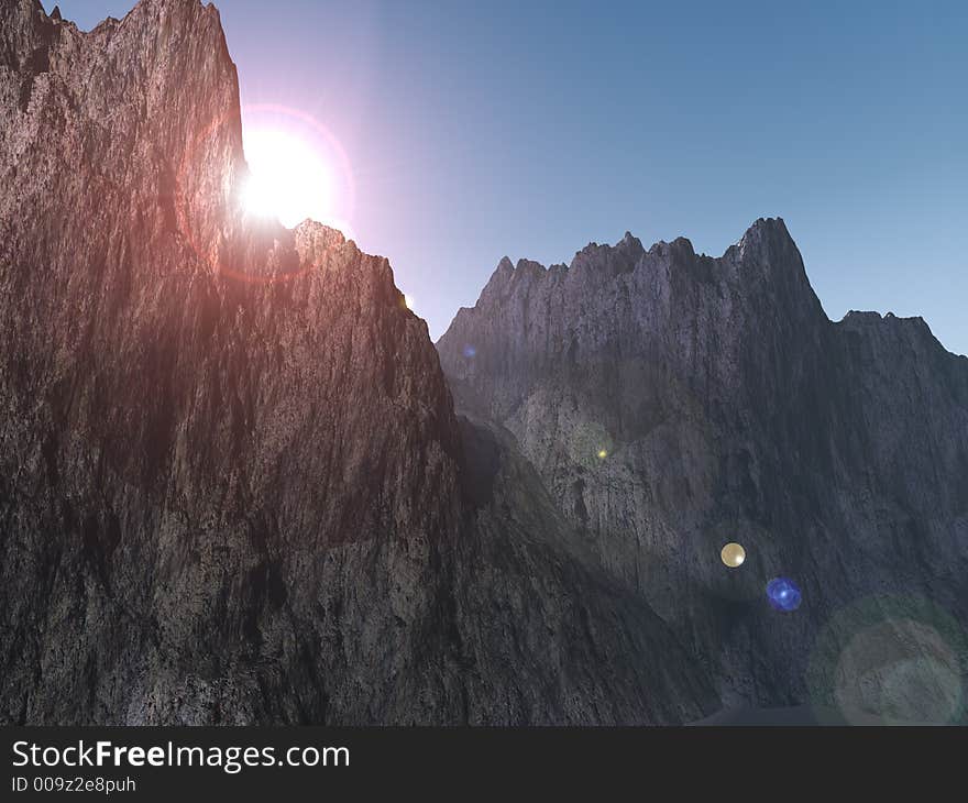 The sun looking through through rocks