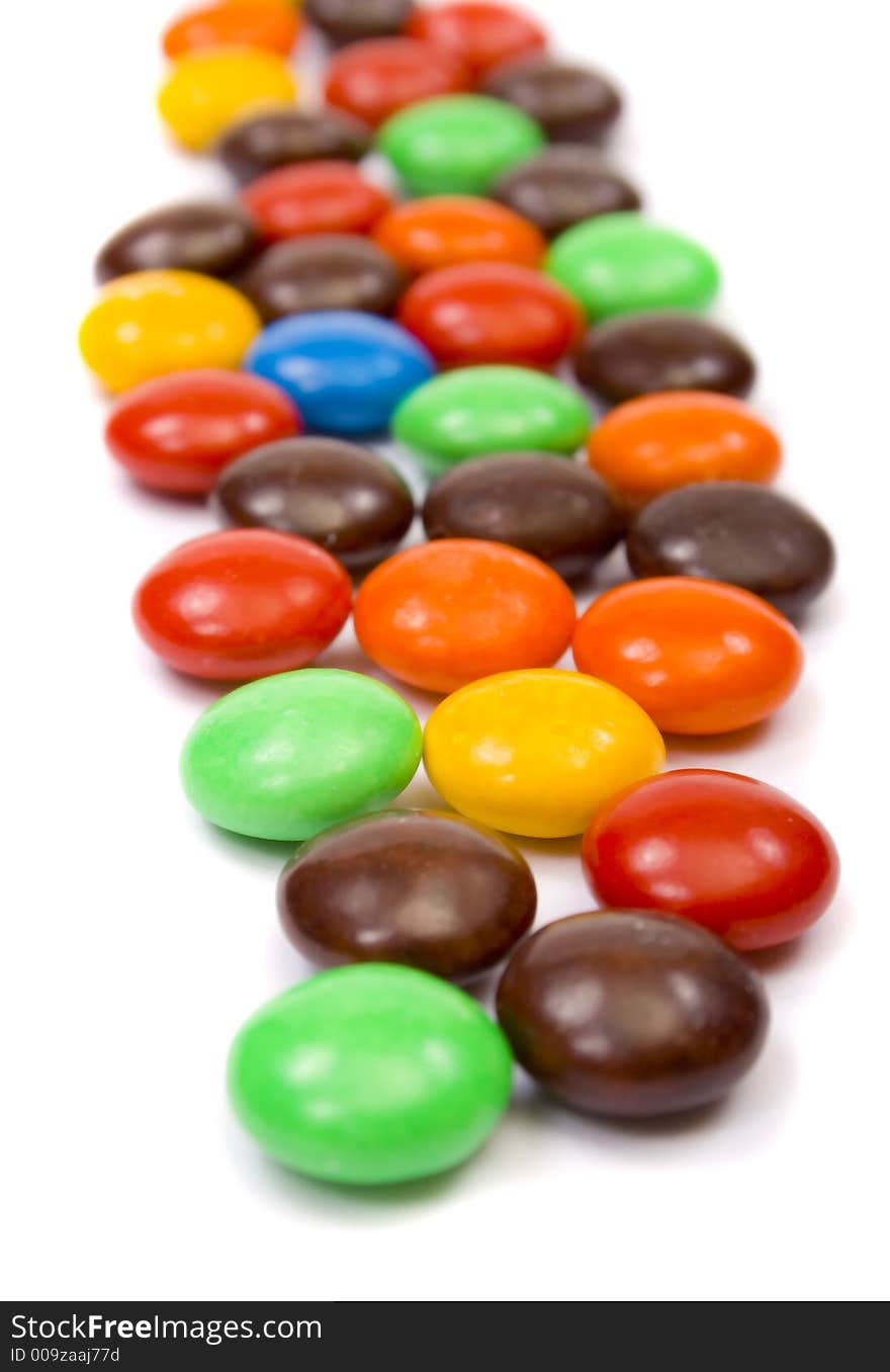 Colorful candies on white background