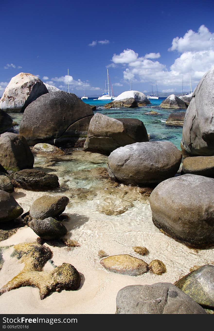 Granite rocks on a tropical beach. Granite rocks on a tropical beach