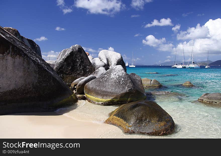 Granite rocks on a tropical beach. Granite rocks on a tropical beach