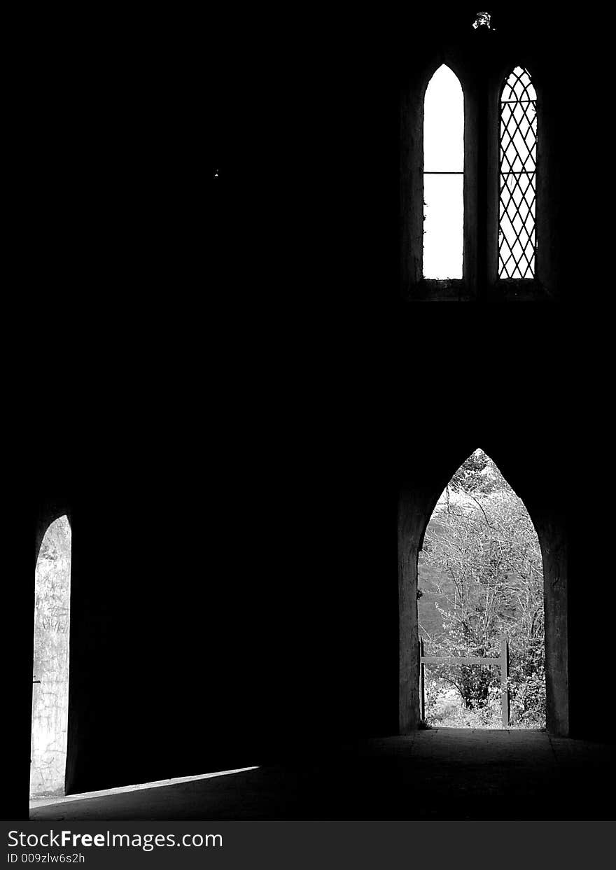 Light filtering through the doors and windows of an abandoned church at Narayanpur, near Pune India. Light filtering through the doors and windows of an abandoned church at Narayanpur, near Pune India.