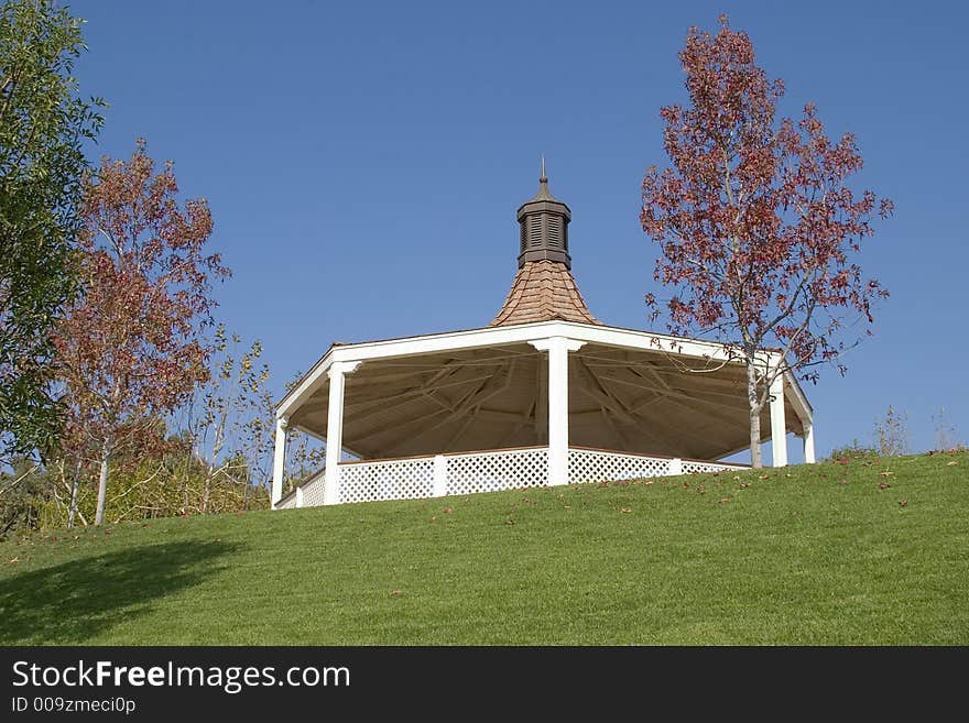 Replica of a Victorian bandstand surrounded by a grassy amphitheater.