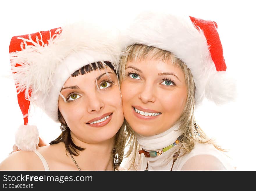 Couple brunette and blonde girl in Santa Caps