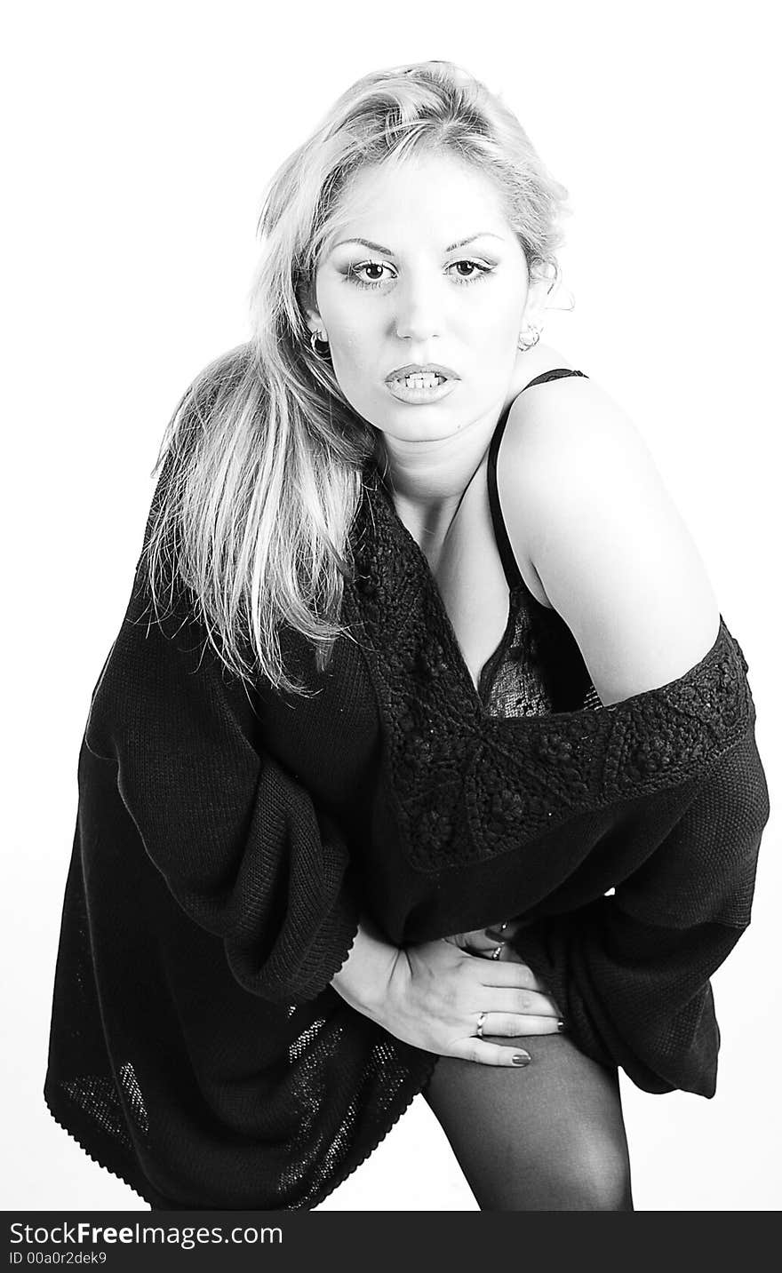 Portrait of pretty young woman. Shot in studio. Portrait of pretty young woman. Shot in studio.