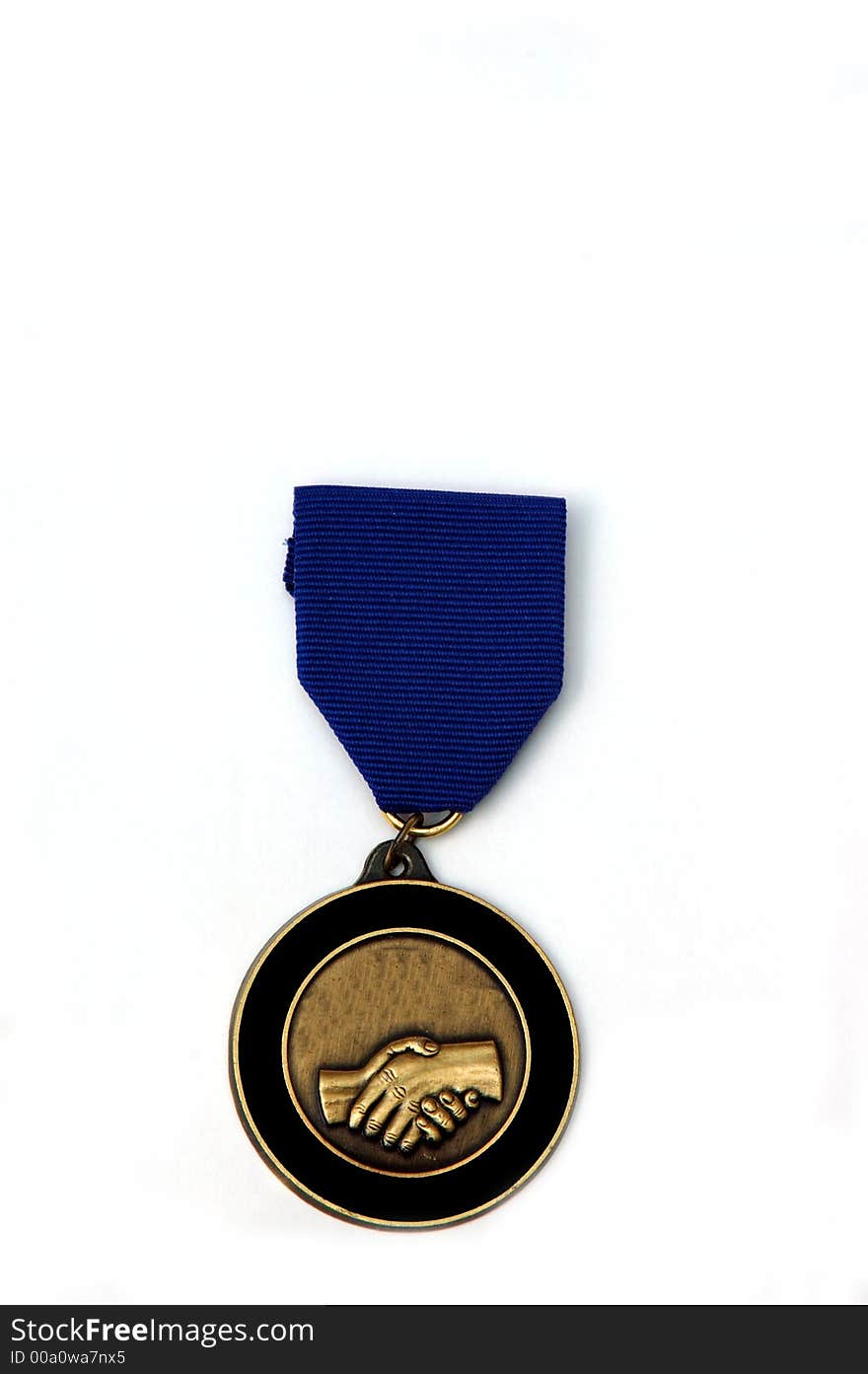 A medal awarded for co-operation against a white background. A medal awarded for co-operation against a white background