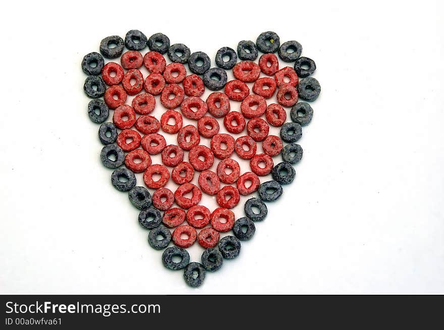 Heart shape formed using the fruit loop cereals. Heart shape formed using the fruit loop cereals