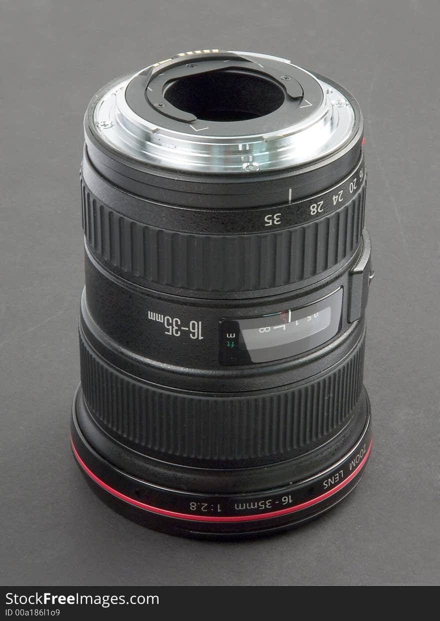 Professional digital camera zoom lens over black