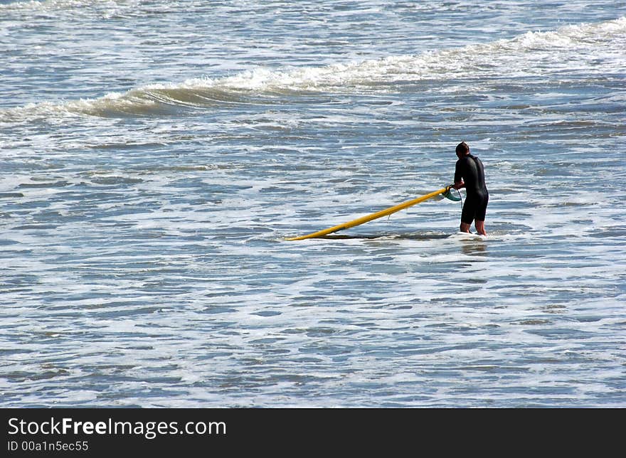 Surfer at the beach in ca