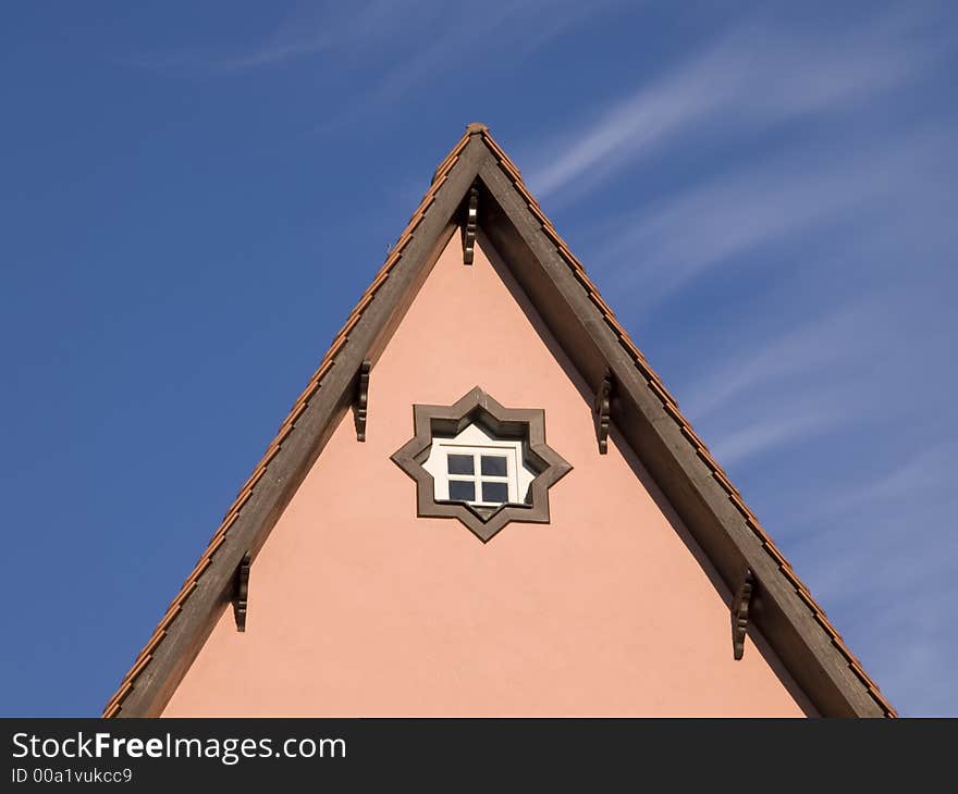 Gable of a baroque house in front of blue sky