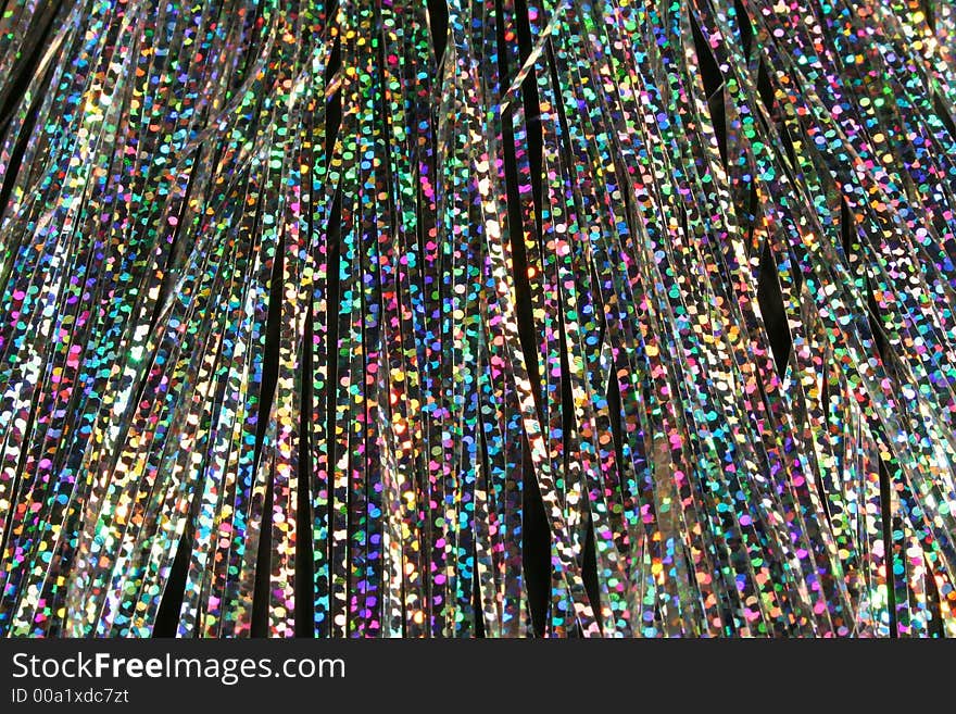 Abstract background of holographic tinsel from x-mas decoration