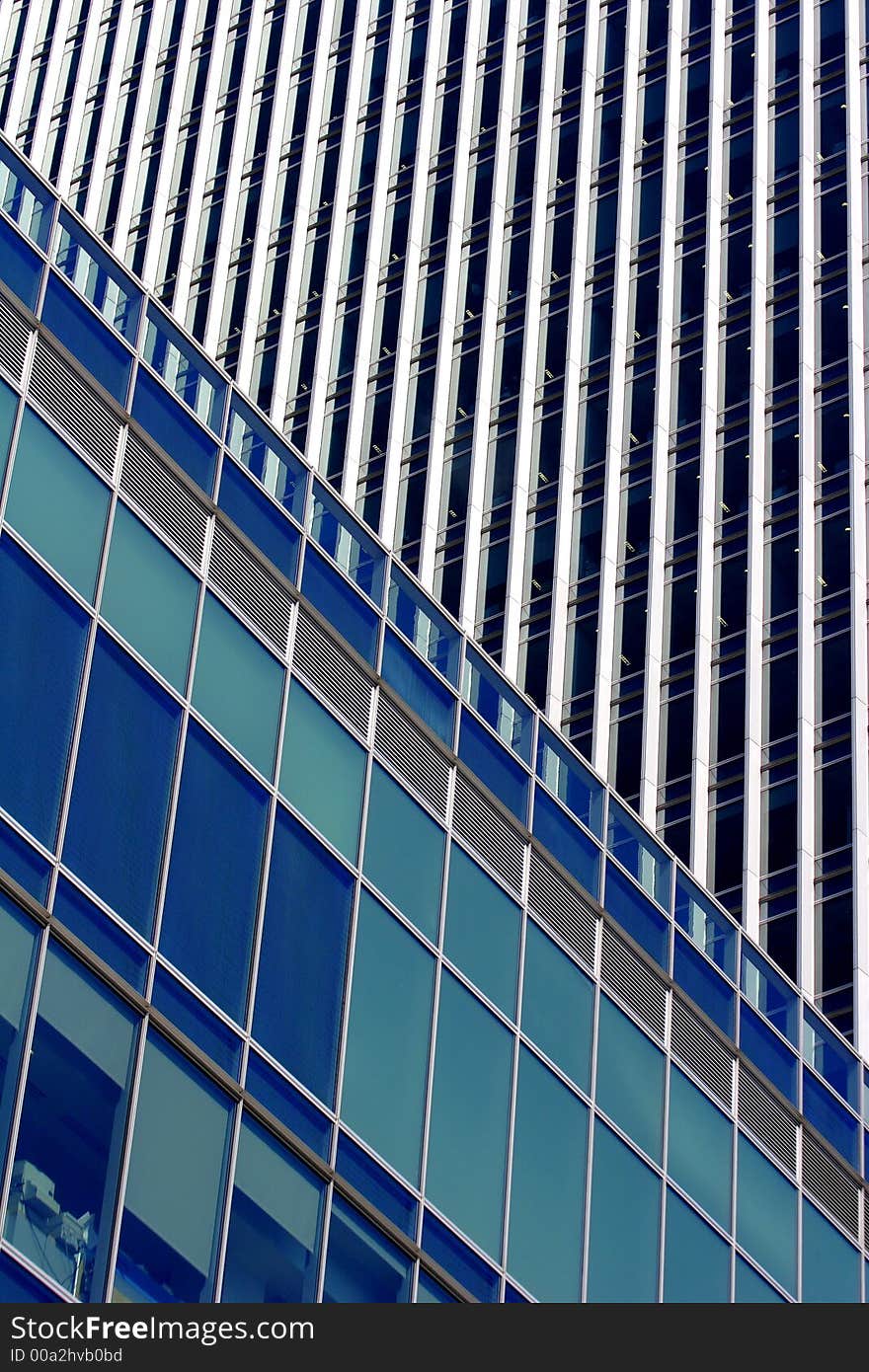 Reflection, shapes and textures of modern office building