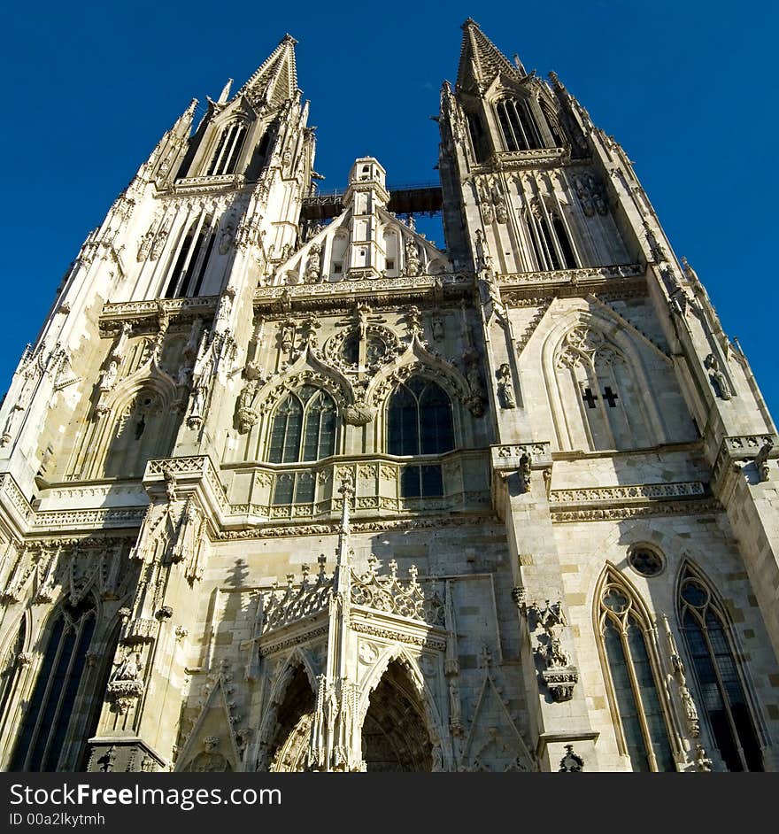 The ornate front of the medieval cathedral at Regensburg, Germany. The ornate front of the medieval cathedral at Regensburg, Germany.