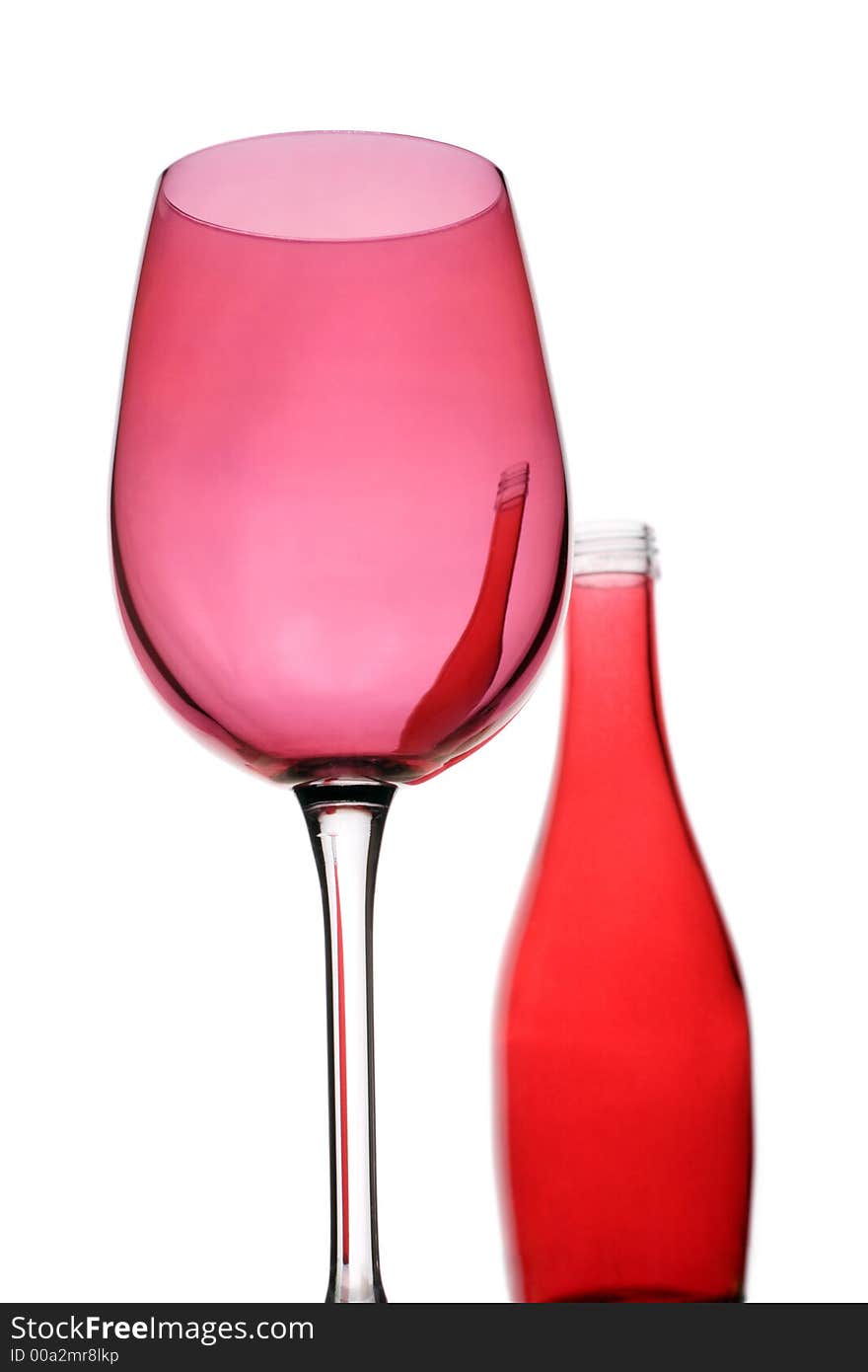 Contemporary red wine glass and bottle. Contemporary red wine glass and bottle