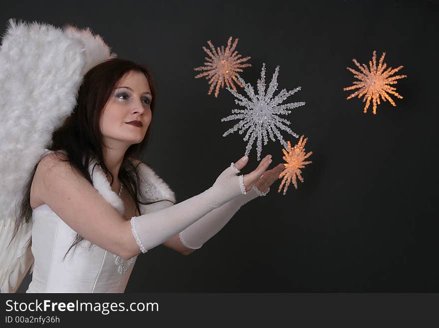 White Angel catching crystal stars