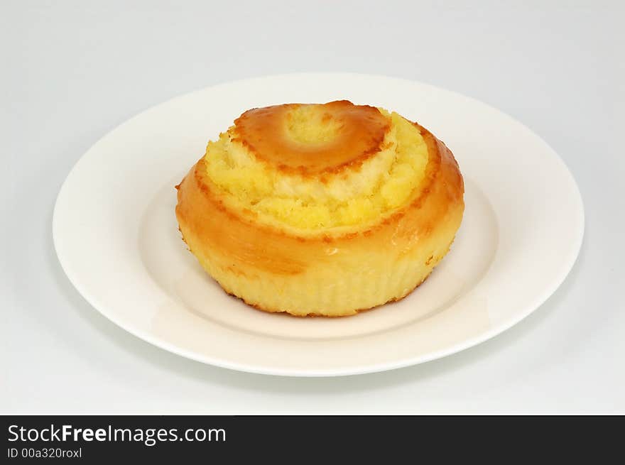 Sweet Bun on White Plate. Sweet Bun on White Plate