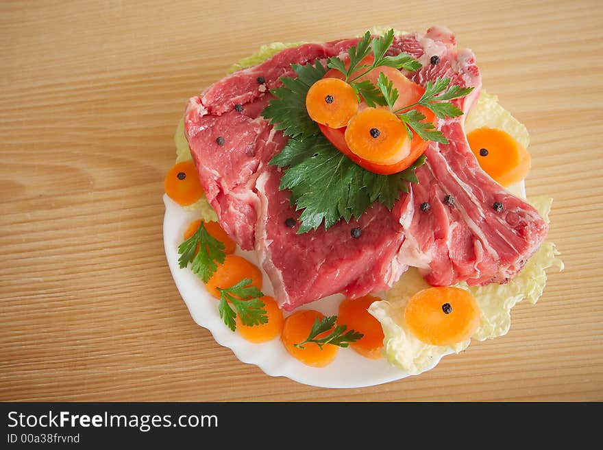 Pork meat decorated with vegetables