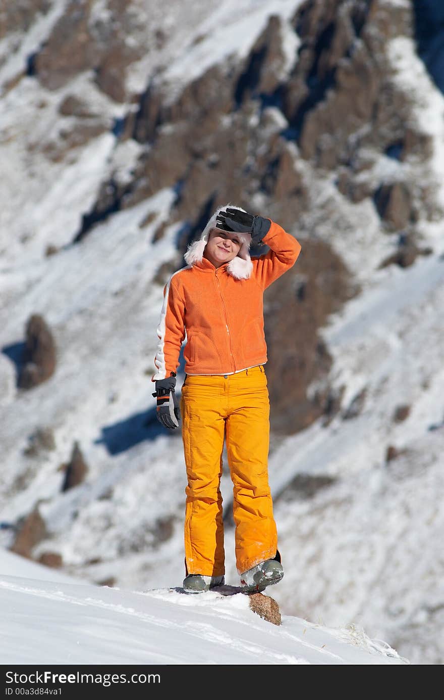 Orange girl in high mountains