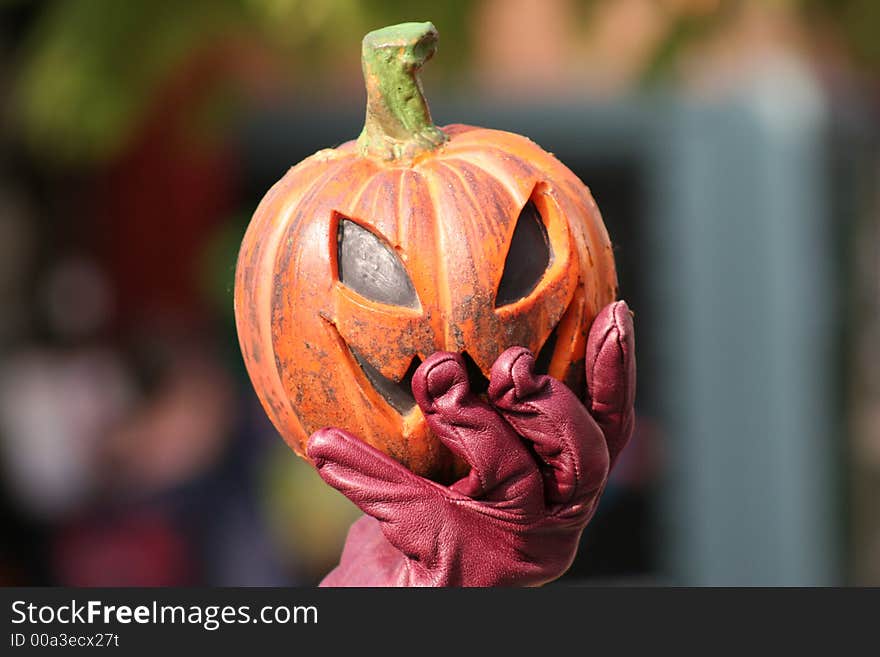 Scary pumpkin being presented for Halloween preparations. Scary pumpkin being presented for Halloween preparations.