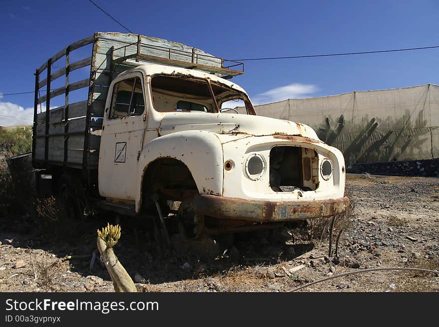 Old weathered rusty truck in burning sun. Old weathered rusty truck in burning sun