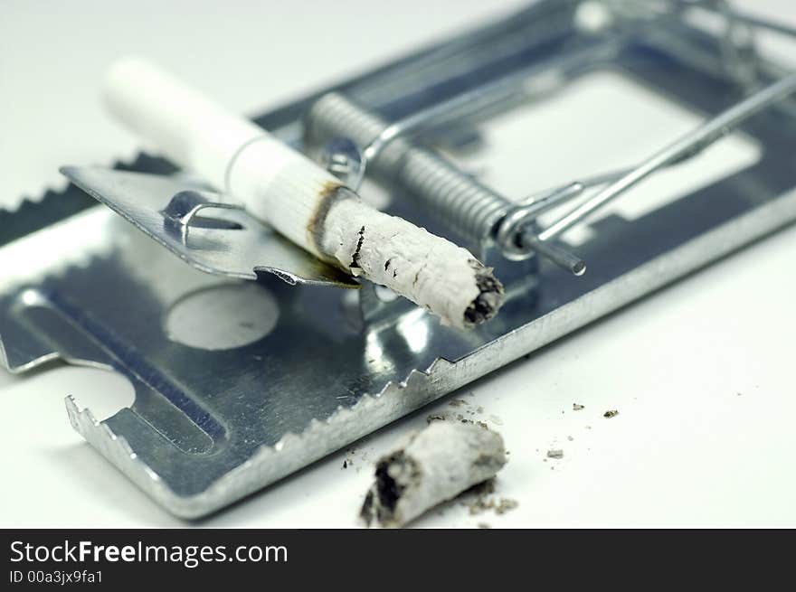 Cigarette trap and concept of taking the risk . Cigarette trap and concept of taking the risk .