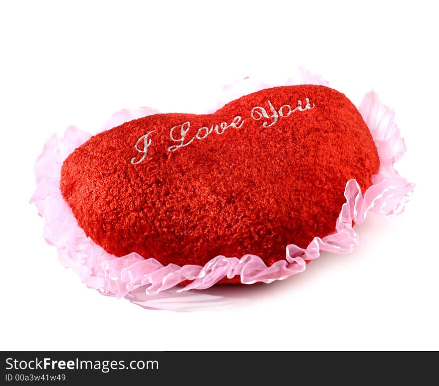 Red heart shaped cushion Valentine concept on white background. Red heart shaped cushion Valentine concept on white background