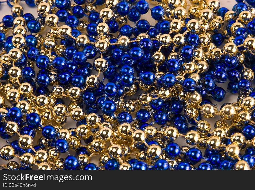 Strings of blue and gold beads