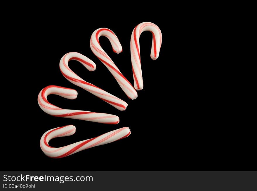 Candy cane arrangement over black