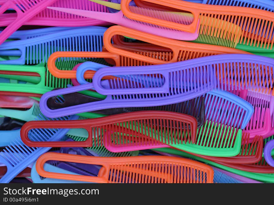 Pile of various colored combs