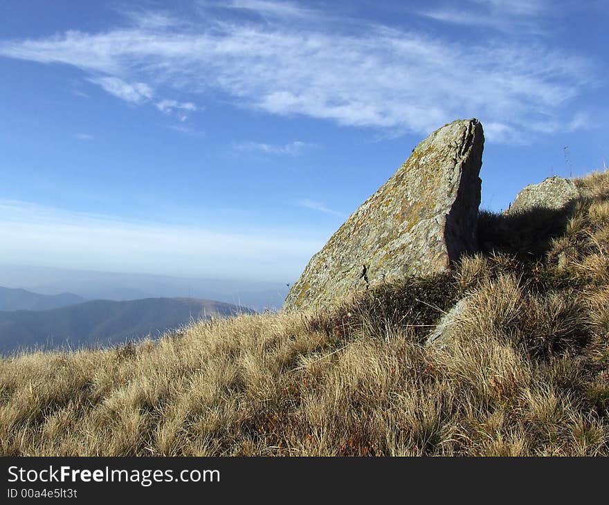 Large and sharp stone rising from the entrails of the earth. Large and sharp stone rising from the entrails of the earth