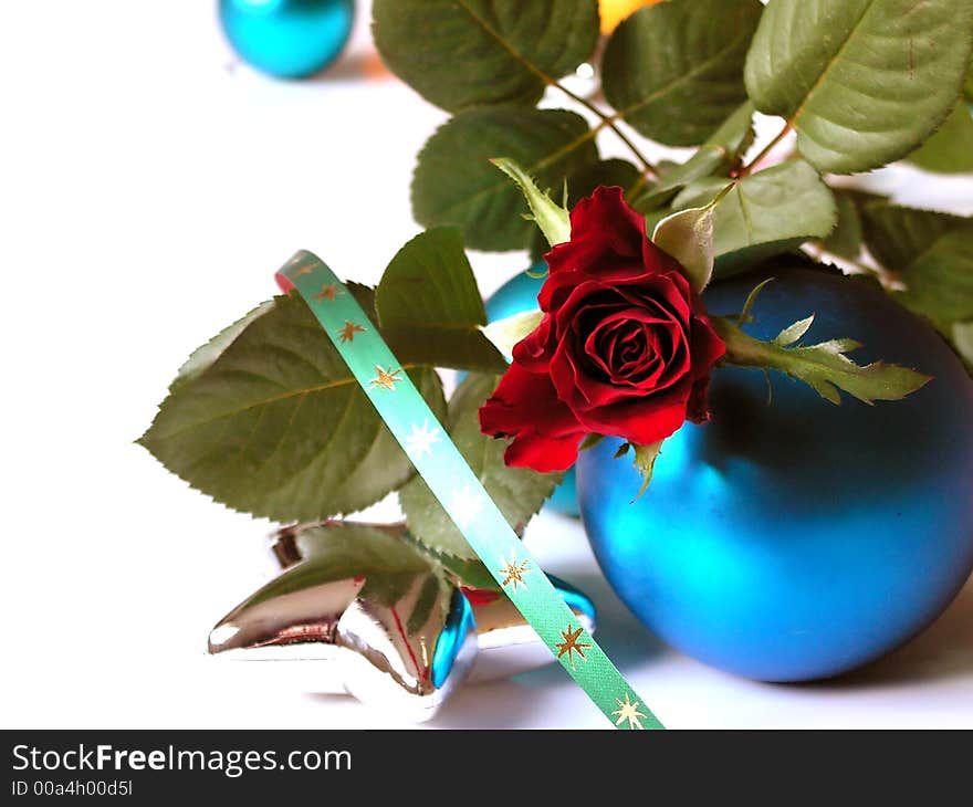 Rose, baubles, star and ribbon on white background. Rose, baubles, star and ribbon on white background