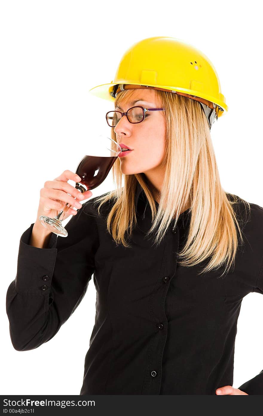 A businesswoman with a glass of wine