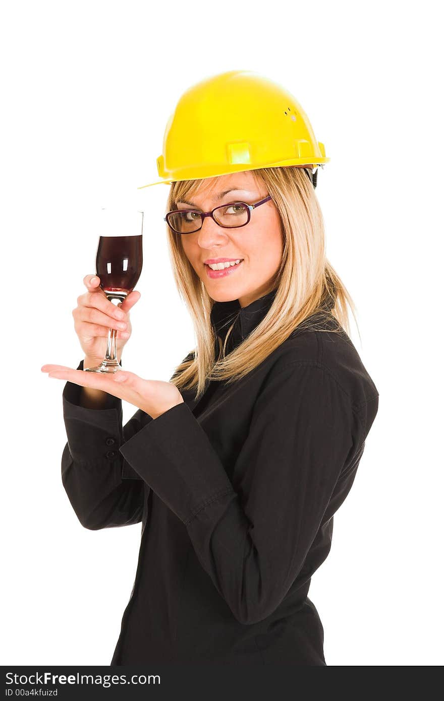 A businesswoman with a glass of wine