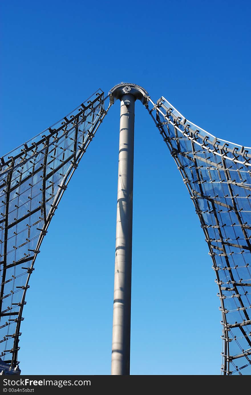 Details roof olympic stadium Munich, Germany. Picture taken from below against blue sky