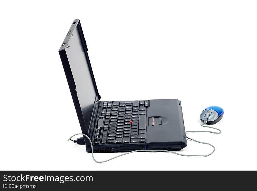 Black laptop with mouse on pure white background. Black laptop with mouse on pure white background