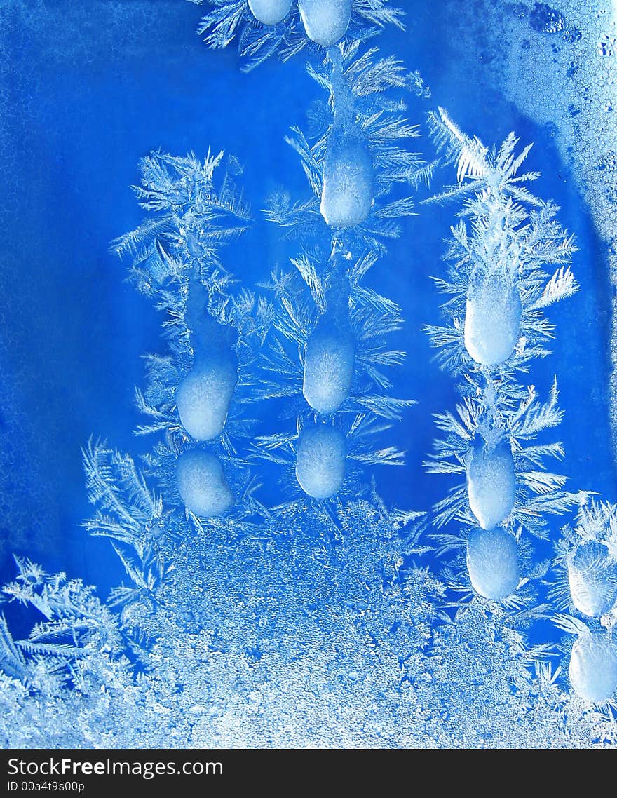 Beautiful frozen icy drop on window. Beautiful frozen icy drop on window