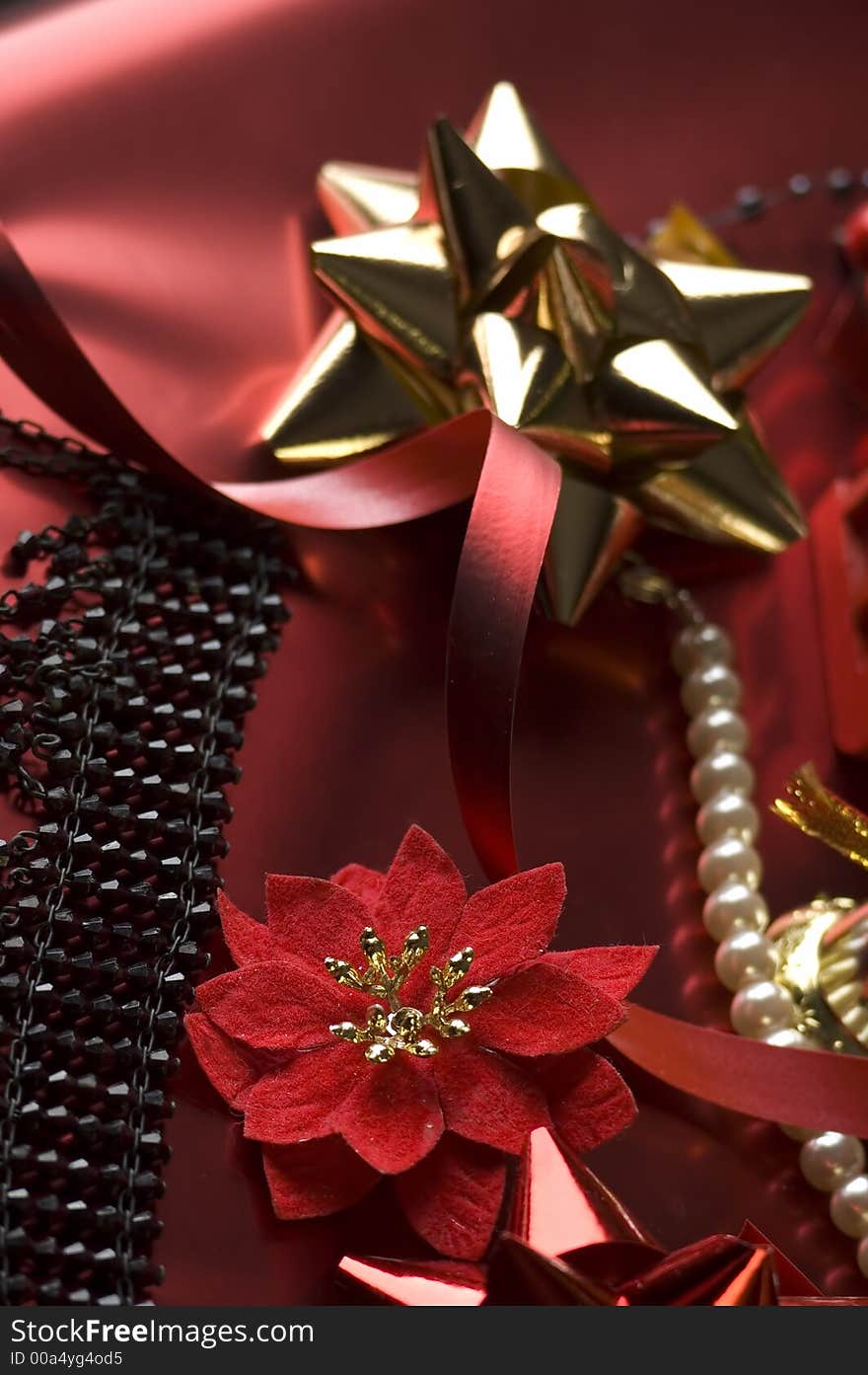 Christmas decoration on red paper close up