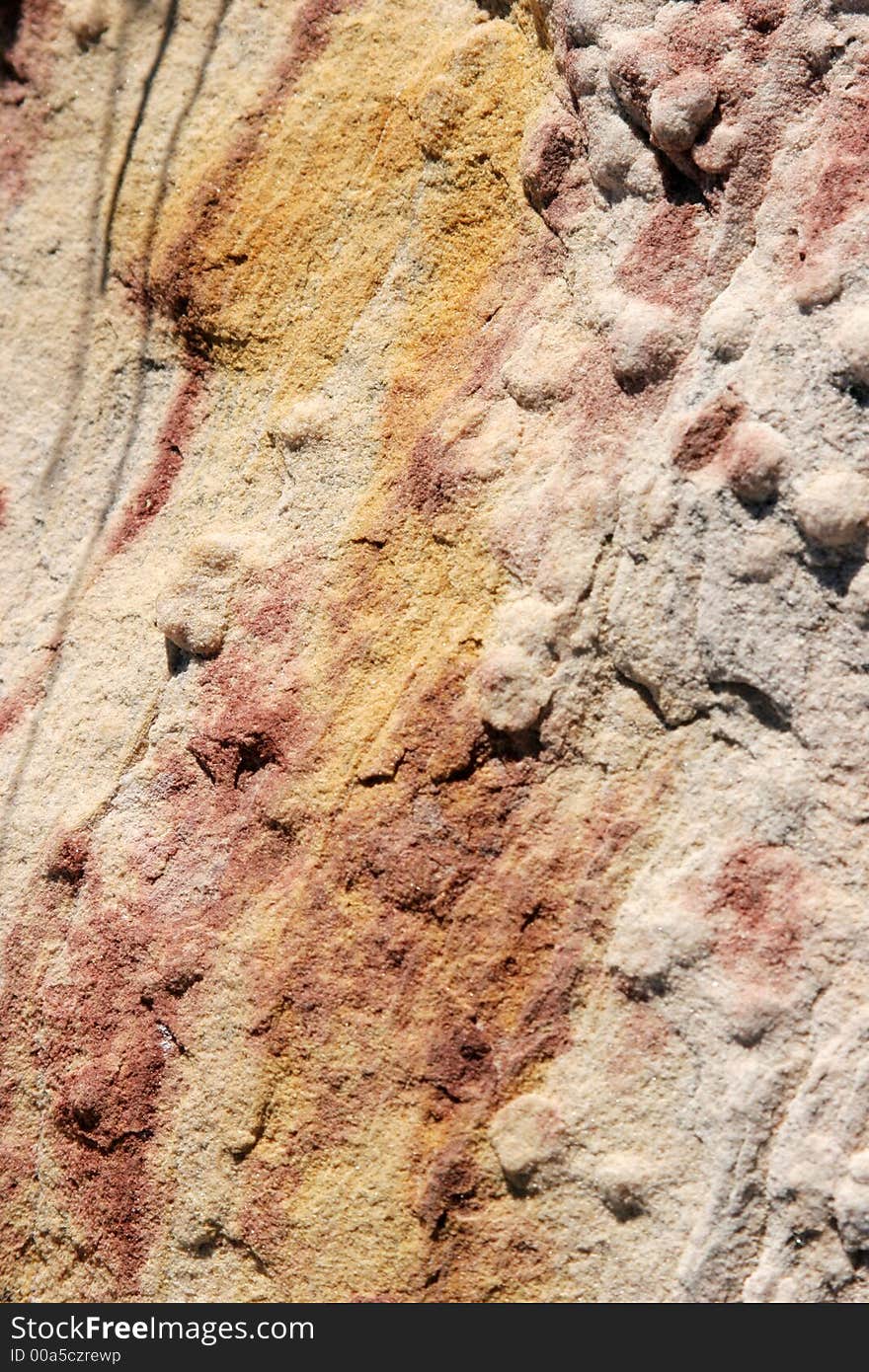 Sandy red rock textured surface. Sandy red rock textured surface