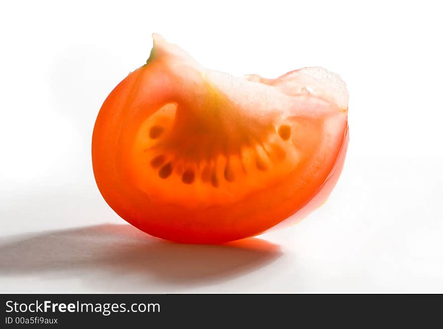 Tomato slices, lobules on the white