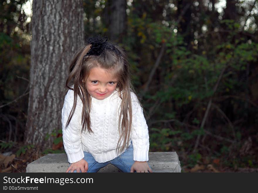 Look at Me!  I look cute sitting here on my garden bench posing for a photo shoot.