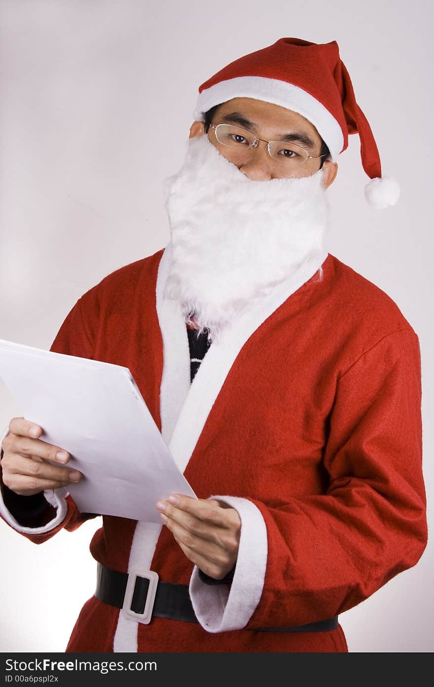 An Asian Santa Claus with check list.