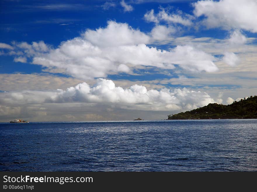 White Clouds Over The Sea